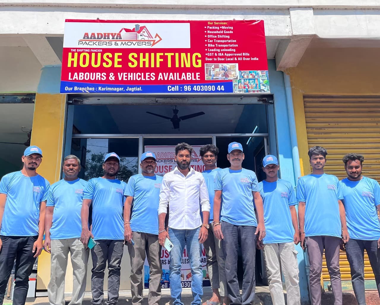 The Aadhya Packers and Movers crew outside the Karimnagar branch office
