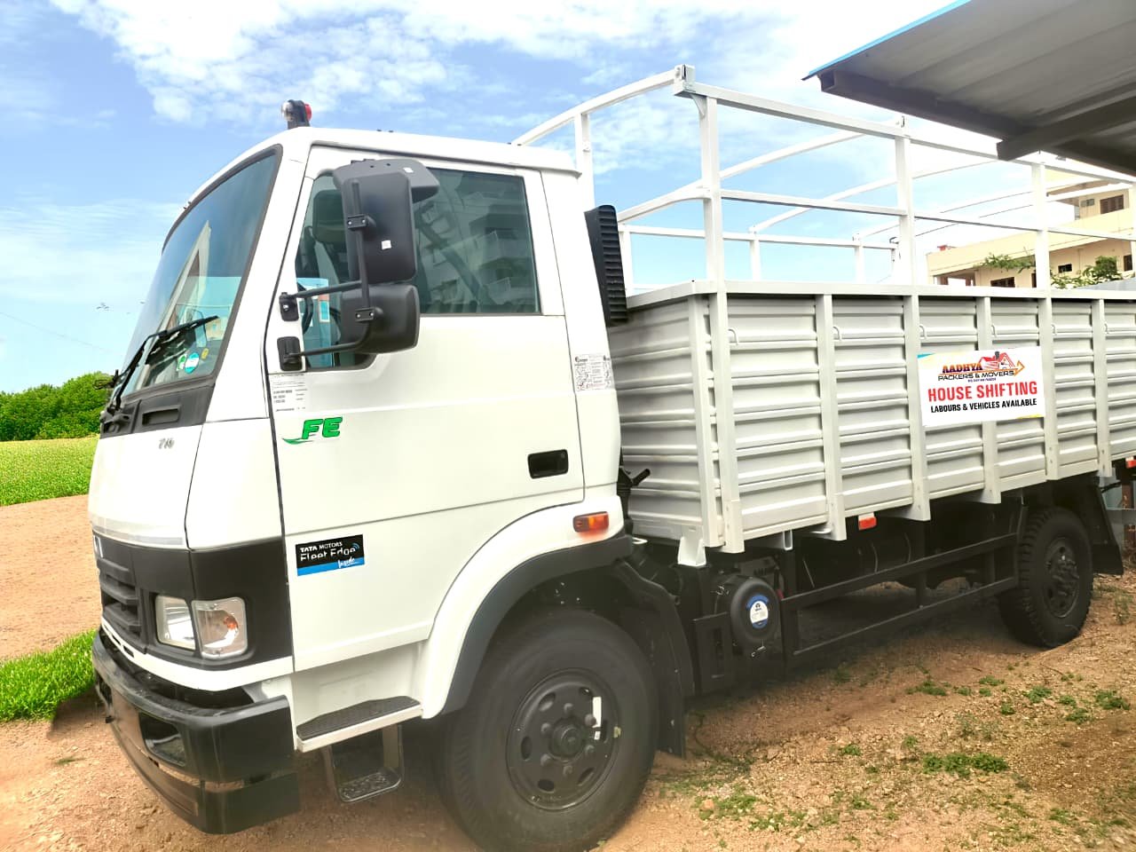 Aadhya Packers and Movers closed-body vehicle loaded for a house shifting job